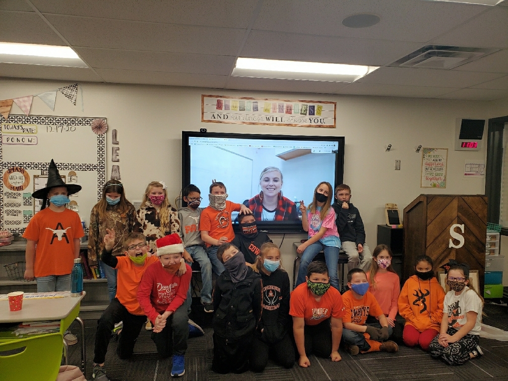 4th grade class posing with Mrs. Sturgell